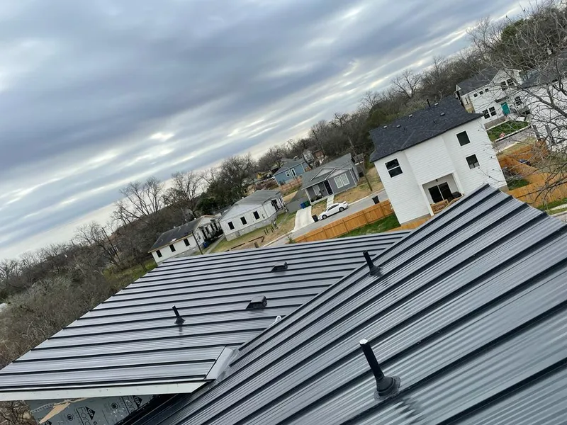 Standing seam metal roof panels with vents for Skylight Repair in Hartland